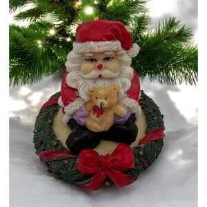 Santa Christmas Figurine Sitting On Wreath Holding Teddy Bear Holiday Decor